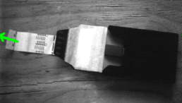 Pull the white tab out of the pack